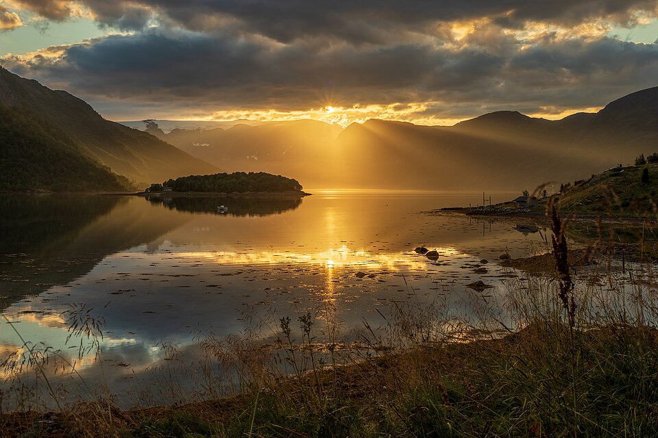 Low sunlight at Øksfjorden in Loppa, Troms og Finnmark, Norway, 2022 August — Geirangerfjord, Norway