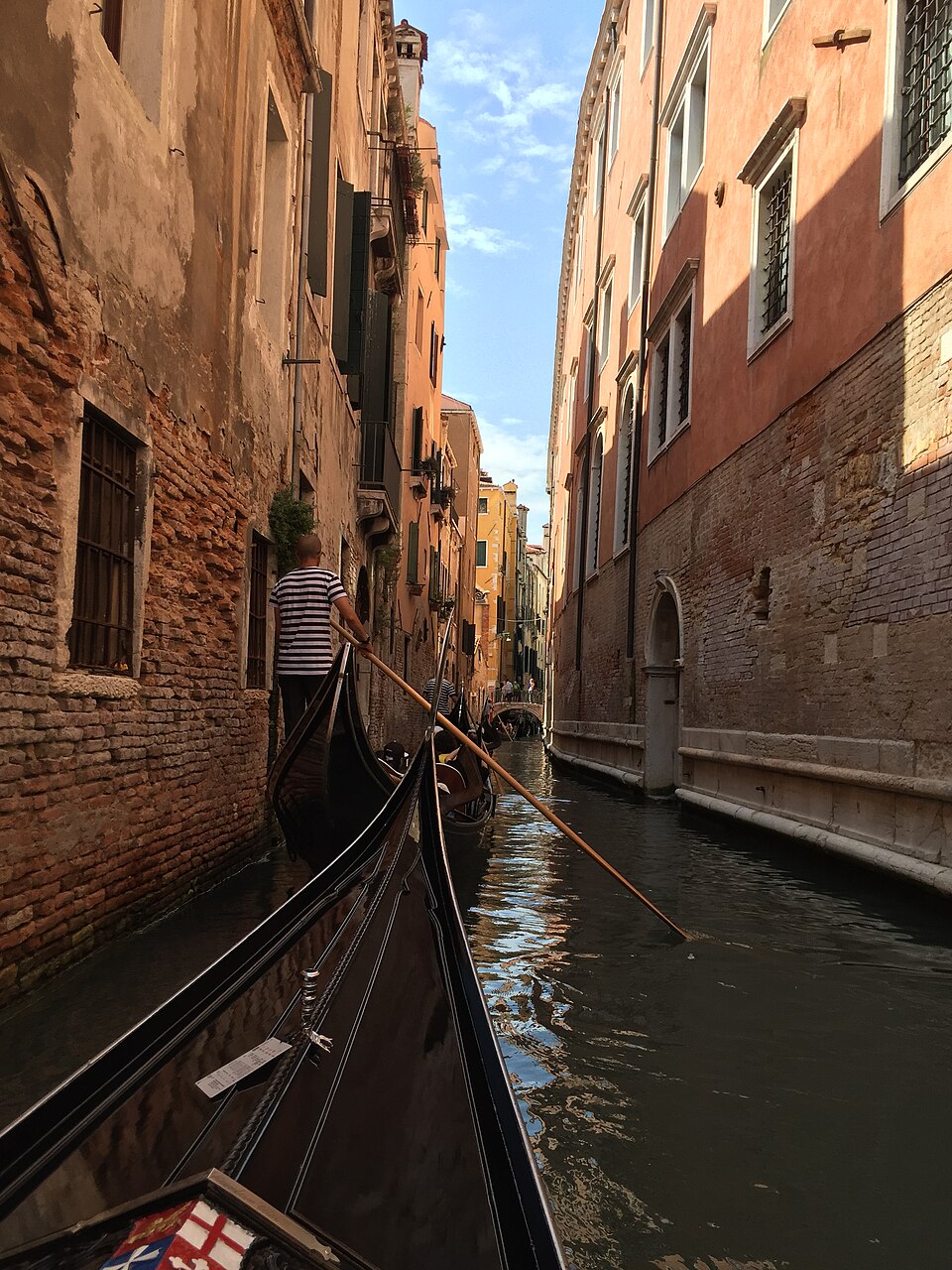 Venice Gondola in narrow canal — Venice, Italy