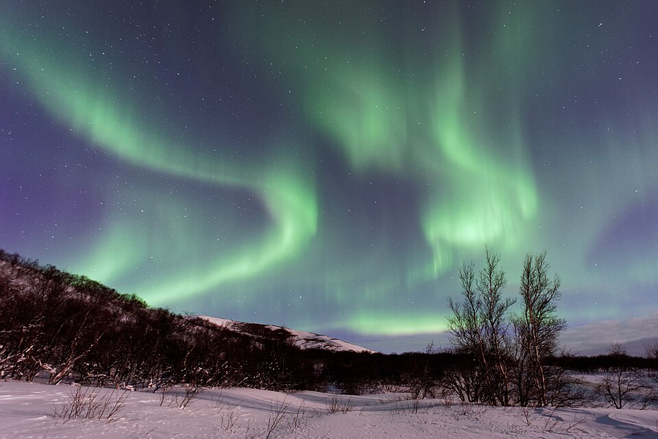 Northern Lights above Iceland (Unsplash) — Akureyri, Iceland