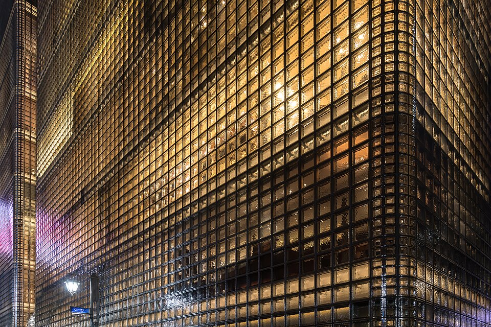 Exterior view of the illuminated facade of Maison Hermès, Ginza, Tokyo, Japan — Tokyo, Japan